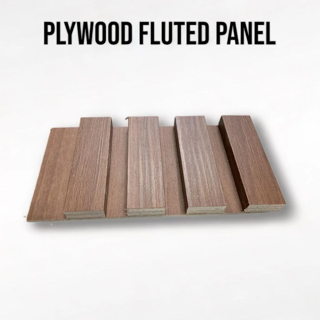 Actual 8-foot plywood fluted sample: four wide shallow strips with visible plywood layers and offset backing