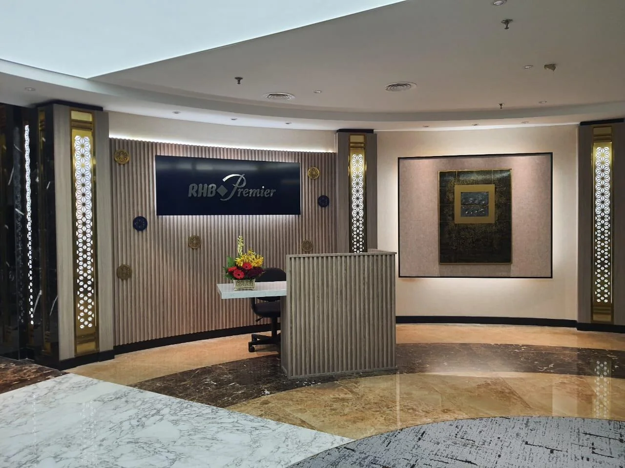 RHB Premier reception with Kaviar Wood and 10-foot solid wood fluted panels